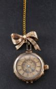 An early 20th century ladies pocketwatch,: the gold-coloured dial with floral decoration to centre,