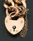 A curb-link bracelet with heart-shaped clasp,: stamped '9C', length ca. 20cm, total weight ca. 14.