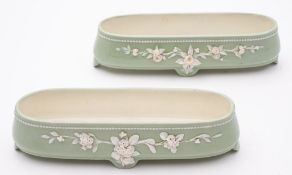 A pair of Minton porcelain posy troughs: applied with white floral sprays below a beaded border on