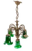 A pair of ormolu four-branch chandeliers : with reeded and scrolled branches with foliate