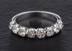 A round, brilliant-cut diamond half-eternity ring,: total estimated diamond weight ca. 0.