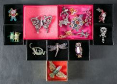 Fauna and flora brooches by Butler and Wilson and others,: set with vari-coloured pastes,