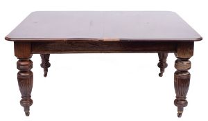 A Victorian mahogany extending table, late 19th century,: the top with moulded edges,