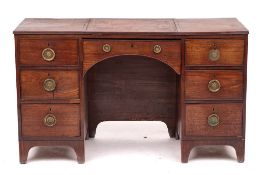A mahogany pedestal desk in George III style,