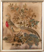 A Victorian Berlin work wool picture of a pheasant: standing amongst shrubs and ferns,