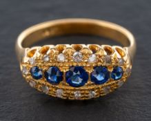 A synthetic sapphire, rose and old-cut diamond ring,: total estimated diamond weight ca. 0.