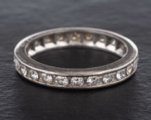 A round, brilliant-cut diamond full-eternity ring,: total estimated diamond weight ca. 0.