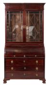 A mahogany and glazed secretaire bookcase, possibly French, circa 1830,