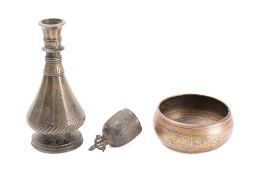 A bronze hookah pipe base : of ovoid form, with knopped neck, 20cm high, a Persian bronze bowl,