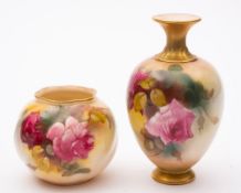 Two Royal Worcester porcelain vases: comprising one of footed oviform the other of globular wrythen