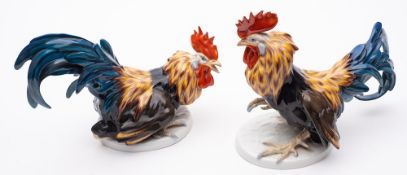 A pair of German Rosenthal porcelain models of cockerels: modelled by Julius Feldtmann,