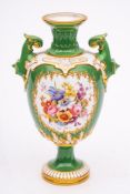 A Royal Worcester porcelain pedestal vase: of two handled form with raised neck and strap work,