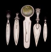 A collection of five assorted silver book marks,
