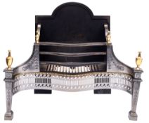 A polished steel and brass fire grate in the George III style: with arched back and