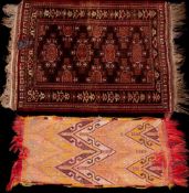 A Nomadic bag:, with a hooked and serrated field, 104cm x 39cm, also a Hamadan rug,