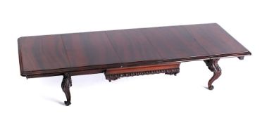 An apprentice's mahogany extending table: the rectangular top with a moulded edge and gadrooned