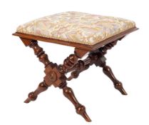 A mahogany and upholstered stool in Regency style, later 19th century,