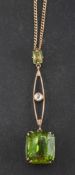 A peridot and old-cut diamond pendant,: calculated weight of principal peridot, ca.
