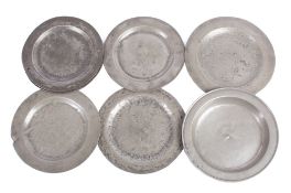 A collection of seven 18th century and later pewter plates: some touchmarks visible, 22.