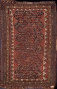 A Quashgai rug:, the indigo field with geometric designs,