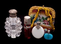 A late Victorian ruby glass and silver mounted scent bottle,