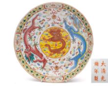 Two Chinese famille rose 'Dragon' dishes: decorated in bright enamels with dragons chasing flaming