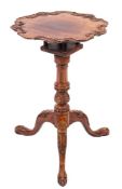 A carved and stained hardwood occasional table in George III style, possibly Chinese,