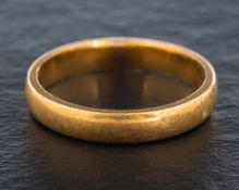 A 22ct gold band ring,: with hallmarks for Birmingham, 1932, ring size K1/2, total weight ca. 3.