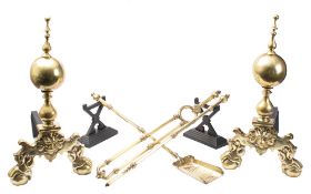 A pair of brass andirons: with ball and spire finials, a cooper coal scuttle,