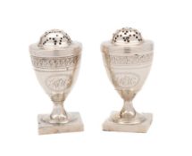 A pair of George III silver pepperettes, maker Duncan Urquhart & Naphtali Hart, London,