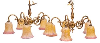 A pair of brass and coloured glass five light electroliers, by Christopher Wray of London,