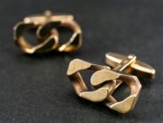 A pair of 9ct gold, curb-link cufflinks,: with import marks for Birmingham, 1972, length of head ca.