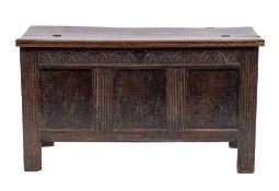 A Jacobean oak coffer, late 17th century and later adapted,