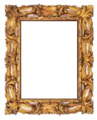 An Italian carved and giltwood rectangular mirror or picture frame, in late Baroque taste,