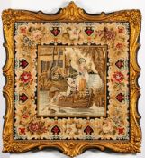 A 19th century gilt framed woolwork tapestry: depicting a women and a young boy in a rowing boat,