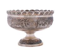 A Burmese silver pedestal bowl: of circular outline with wavy edge border,