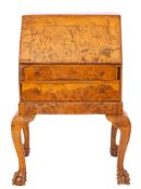 An oak and pollard oak bureau in 18th century taste, circa 1900,