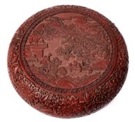 A Chinese carved cinnabar lacquer box and cover: of circular form,