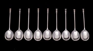 A set of nine George V silver seal top coffee spoons, maker's marks illegible, London,