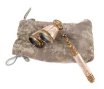 A pair of late Victorian mother-of-pearl opera glasses: with telescopic handle,