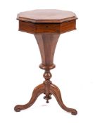 A Victorian rosewood work table, circa 1840,: of octagonal section,