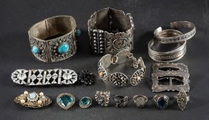 A collection of silver jewellery,: including three bracelets, two bangles, two pairs of buckles,