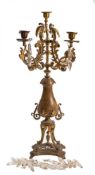 A Victorian gilt metal four branch candelabrum:,