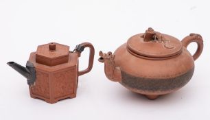 Two Chinese Yixing teapots and covers: the first of hexagonal form with metal spout and handle