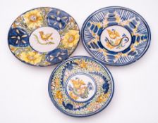 A Puente Arzobispo faience deep bowl: painted in green,