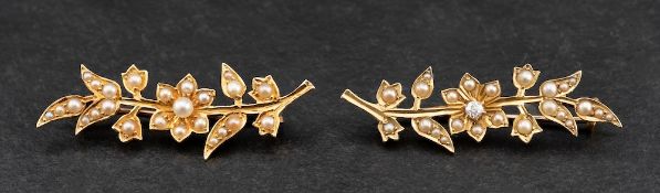 A pair of Victorian, gold, cushion-cut diamond and seed pearl flower brooches,
