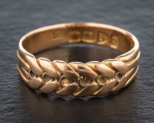 An 18ct gold ring designed as a head of corn,: hallmarks for Chester, 1899, ring size M,