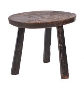 A stained hardwood, probably elm and oak cricket table, 18th century and later,