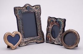 Four assorted silver photo frames, various makers and dates: various sizes,