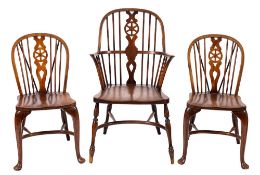 An elm and beech wheelback Windsor armchair, 20th century,